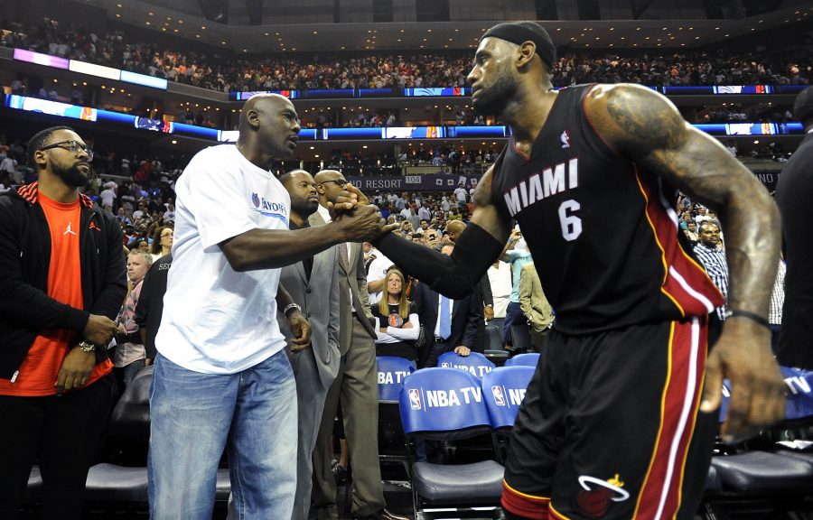 Charlotte Bobcats team owner Michael Jordan shakes hands with Miami Heat forward LeBron James (6), after the Heat defeated the Bobcats, 109-98, in Game 4 of the NBA Eastern Conference quarterfinals at Time Warner Cable Arena in Charlotte, N.C., Monday, April 28, 2014. The Heat swept the series, 4-0. (David T. Foster III/Charlotte Observer/MCT)
