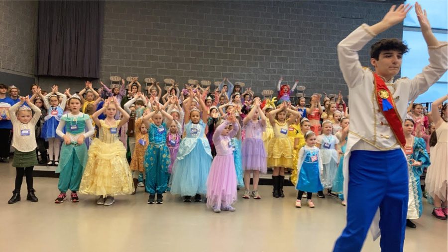 All girl groups practicing the dance one more time before performing for their parents at the end of the camp day.