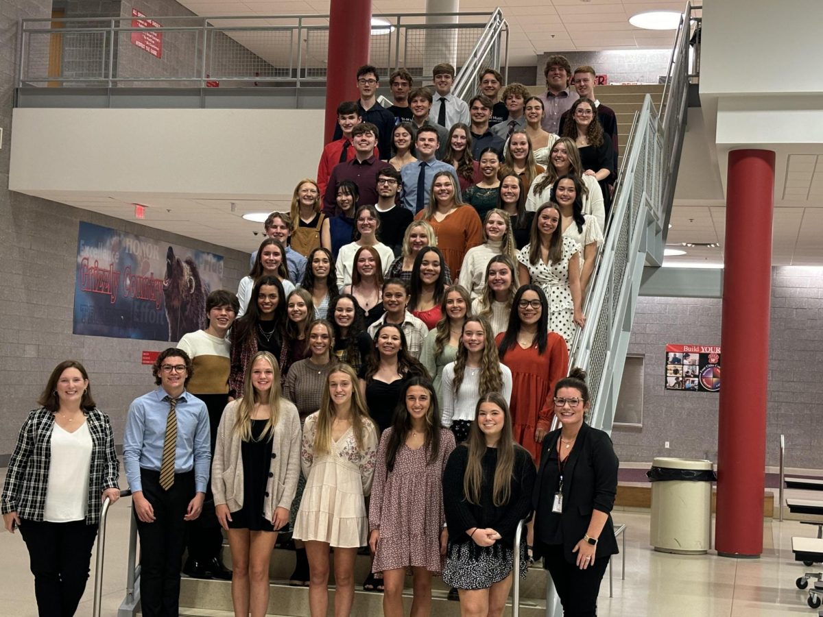 Tri-M members stand for a picture after their induction ceremony. Tri-M is made of upperclassmen from both the band and choir. Photo Courtesy of Kaylin Davis. 