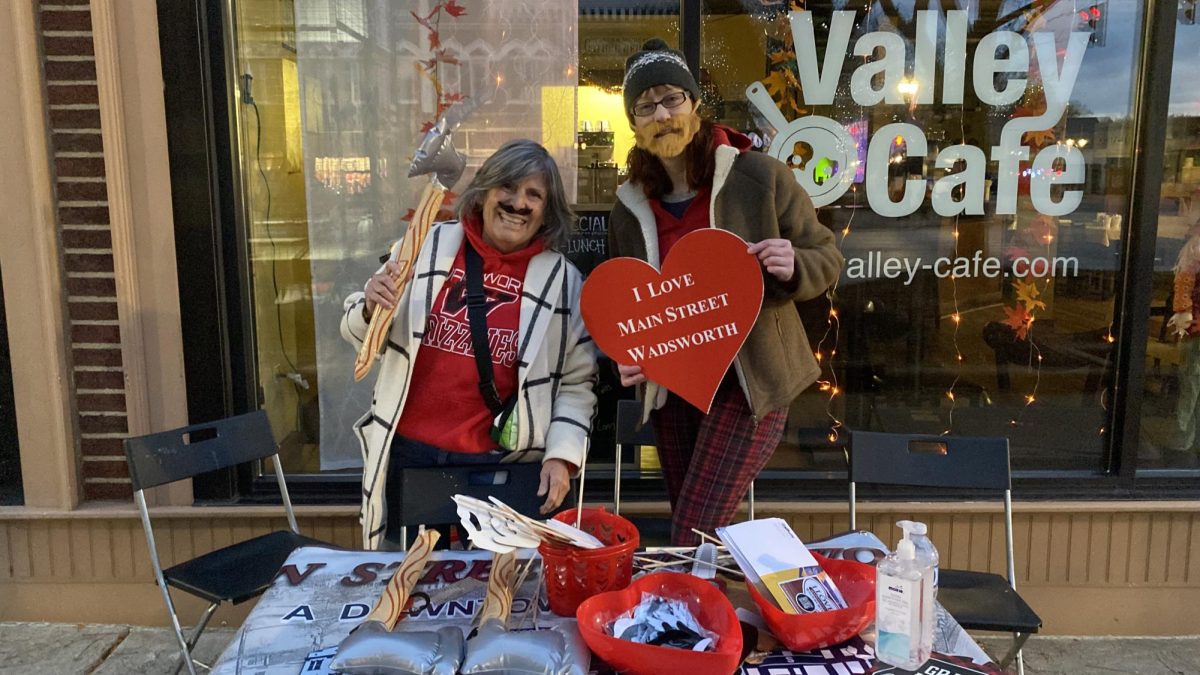 Main Street Wadsworth had a booth where you could receive a stick-on mustache and take some pictures with props. Their stand was located next to the ax throwing and in front of Valley Cafe. Photo by Larkin Tackett.