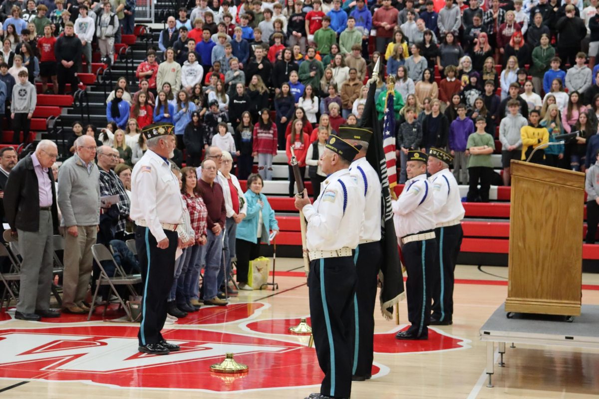 Veterans presenting the colors at the beginning of the assembly. They carried them out at the end of the assembly. Photo by Reagan Riggenbach.