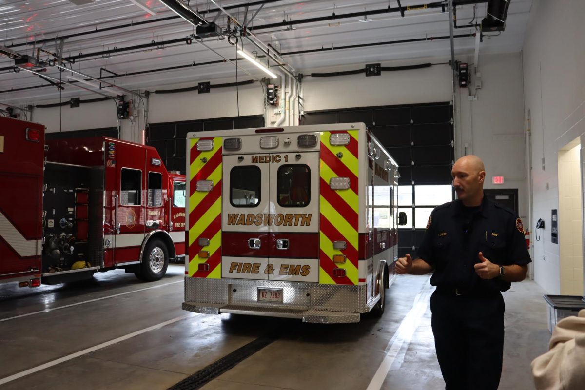 Wadsworth Fire Chief, Bob Lindner stands in front of one of the new ambulances. All new pieces of apparatus that were purchased for this new station cost over five million dollars. Photo by Haley Reedy. 
