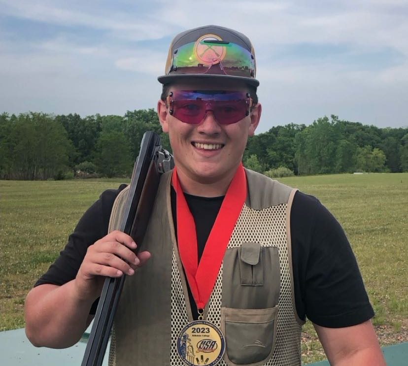 Max Hatfield posing with his trap shooting rifle. Hatfield has been practicing for the upcoming Summer Olympics that will be held in Paris, France. Photo courtesy of Max Hatfield.