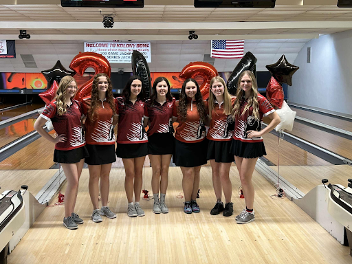  All of the senior girls posing for a picture together on senior night before their match. Photo courtesy of Cece Craig. 