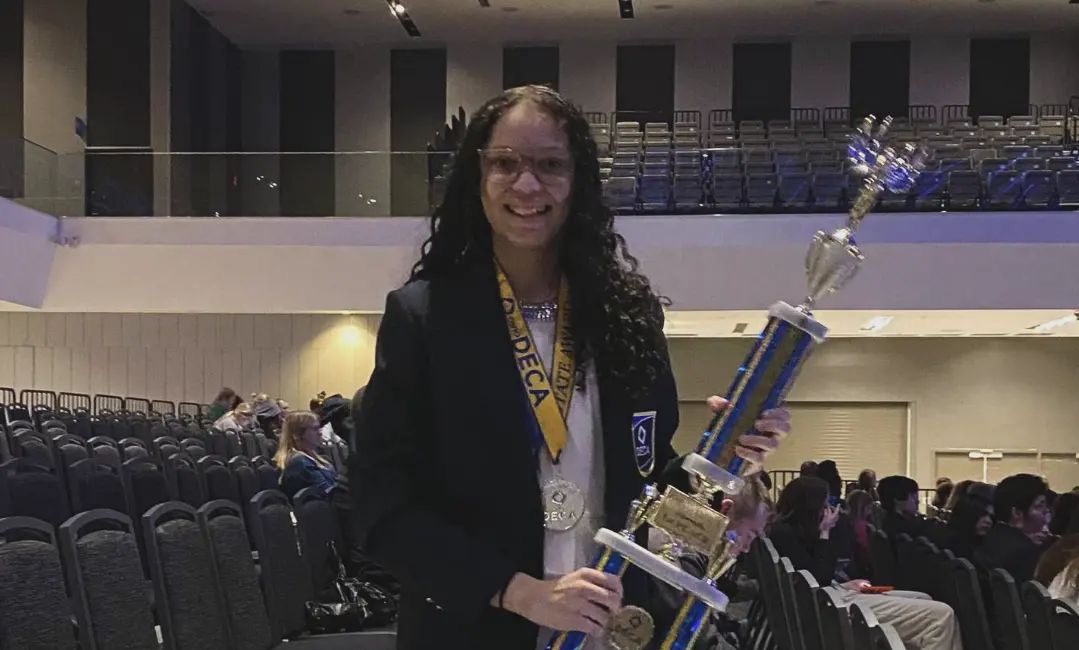 Hailey Harris holds her first place trophy.  After high school Harris plans to major in political science with the hopes of becoming an attorney.  Photo courtesy of Hailey Harris. 