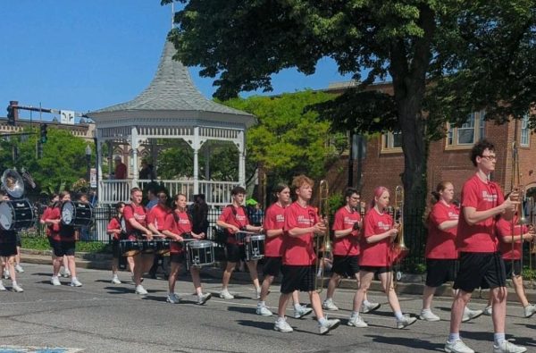 The Wadsworth High School marching band marched on a sunny day. They started marching around the square and will end up at Woodlawn Cemetery. Photo courtesy of Amanda Workman.
