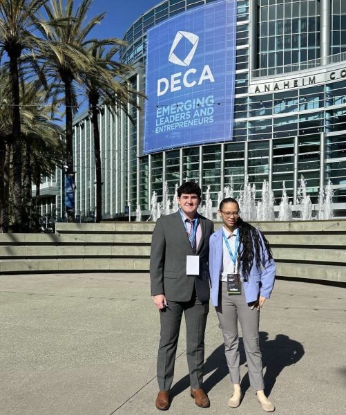 Parker Ross and Hailey Harris are pictured together in front of DECA’s convention center. They were pictured after winning the top 10 nationally at the awards ceremony. Photo courtesy of Parker Ross. 