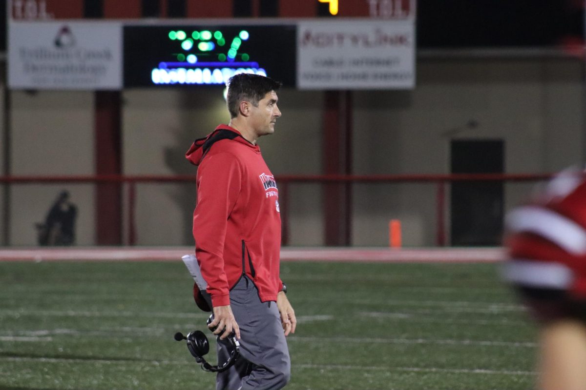 Coach Justin Todd on the sidelines during The Grizzlies playoff game against Brunswick. The Grizzlies went on to win this game sending them to a playoff matchup against Medina. Photo courtesy of Avery Nicholson.