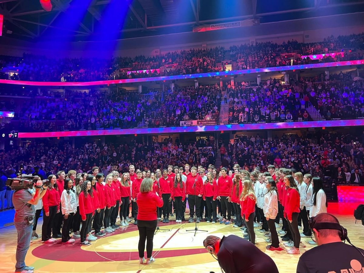 Rhythm in Red and New Edition performed on the court last year. They sang the National Anthem. Photo courtesy of Kalyn Davis.
