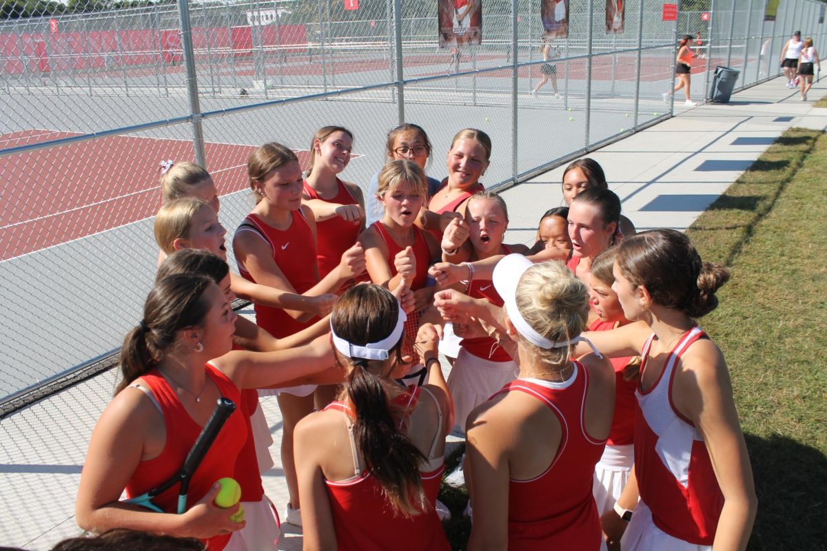 The JV, Junior Varsity, Wadsworth High School Girls Tennis team doing their team chant  after their game.  The team practice and competes at the tennis courts near the Wadsworth Middle School. Photo courtesy of Claire Harig.