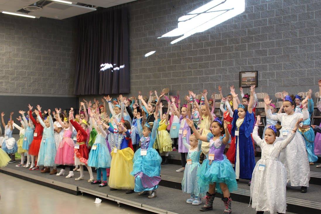 Elementary schoolers perform for their parents after Princess Academy. High school students help them to learn choreography as one of the event's many activities. Photo courtesy of Kalyn Davis. 