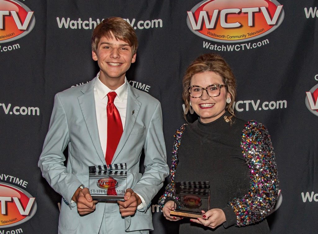 Jack Mallory (left) and Kalyn Davis (right) accepting the Clapper Award together. This is the second Clapper Award Davis has won during her career. Photo courtesy of Tom Stugmyer.