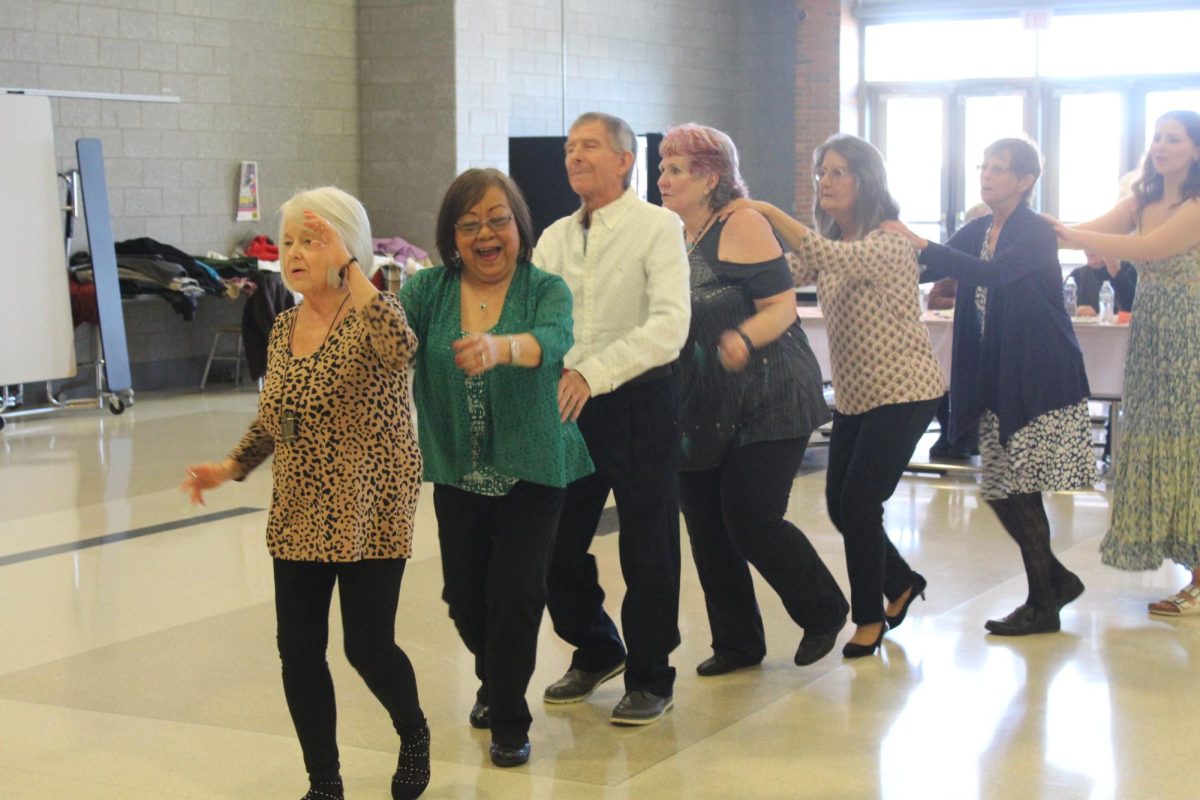 Senior citizens dance at the Spring Fling. Student Council helped organize the event. Photo by Claire Harig.