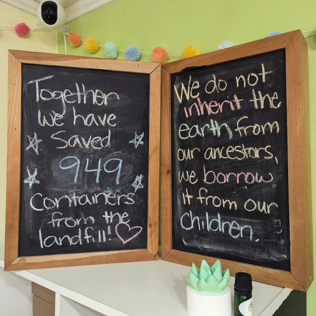 This is a sign displayed in the Kindred Hippie shop. They have since achieved their goal of saving 1,000 containers. Photo courtesy of Emily Ingersoll.