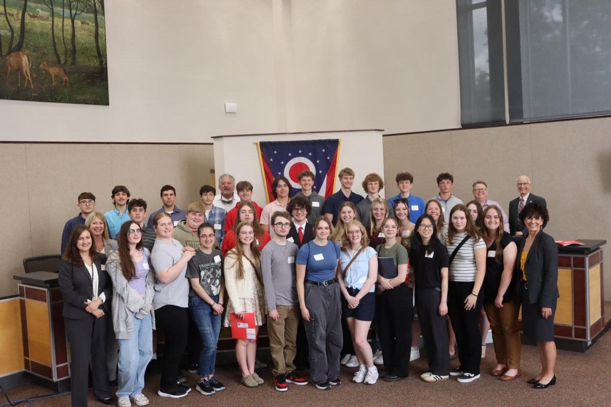 All of the Advanced Placement Government students stand in the City Council Chambers in City Hall. The students posed for the photo with the City Council members.