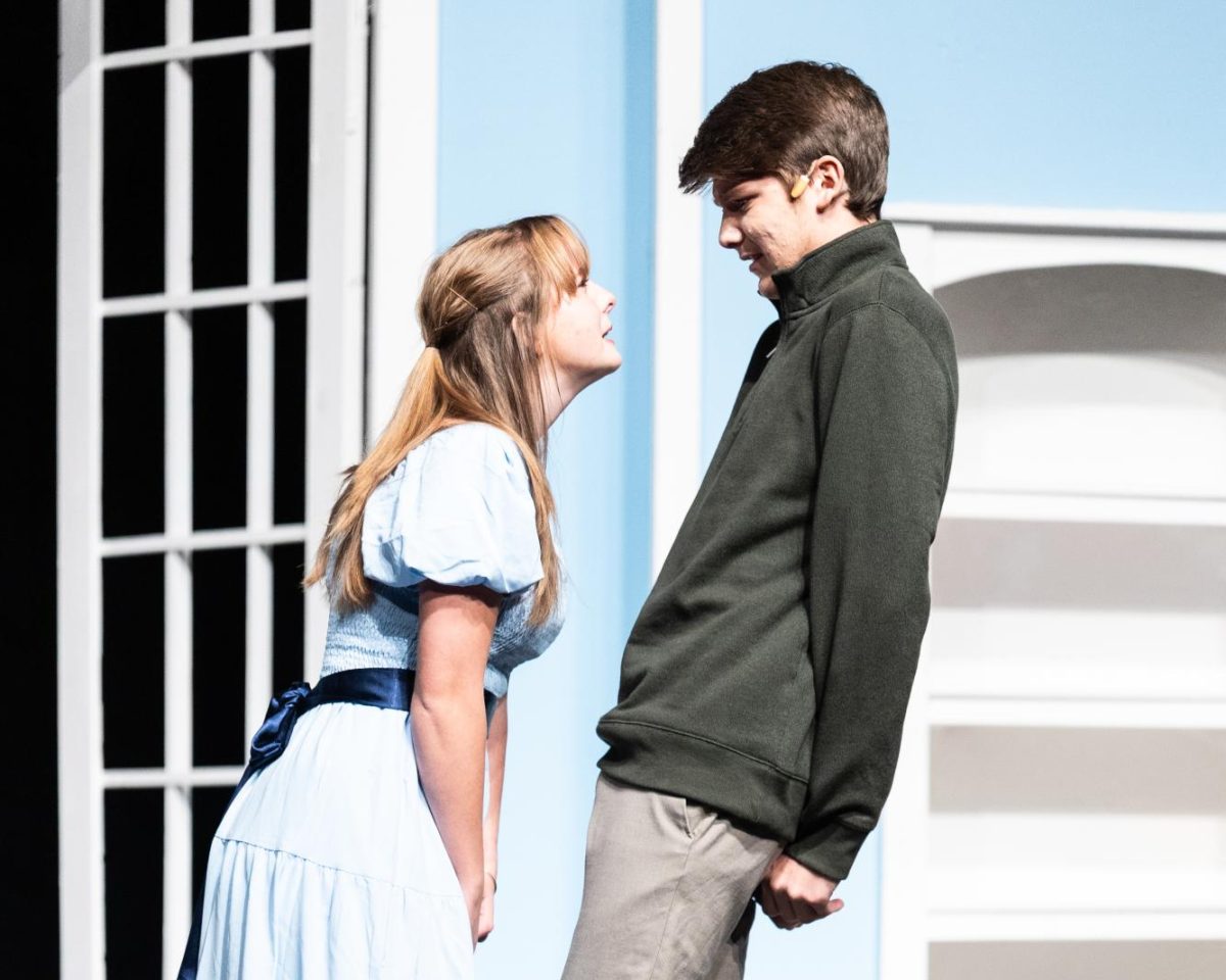 Seniors Kendall Randolph who plays Wendy and Jack Mallory who plays Peter, this was the closing scene of the play. Wendy wanted her kiss back from Peter at this point in the play.