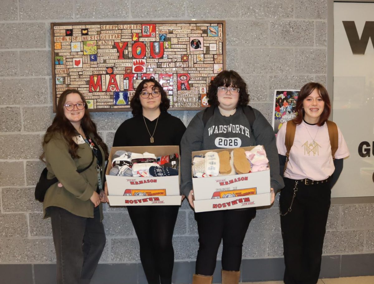 Delaney Jones and the Spectrum Cub met in front of the "You Matter" clay, art project to share their message of acceptance. This is the club's first donation-based event.