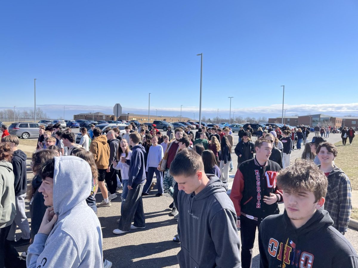 WHS students evacuate the building after orders from Suber to do so. Students were walking to the Wadsworth Intermediate School building.